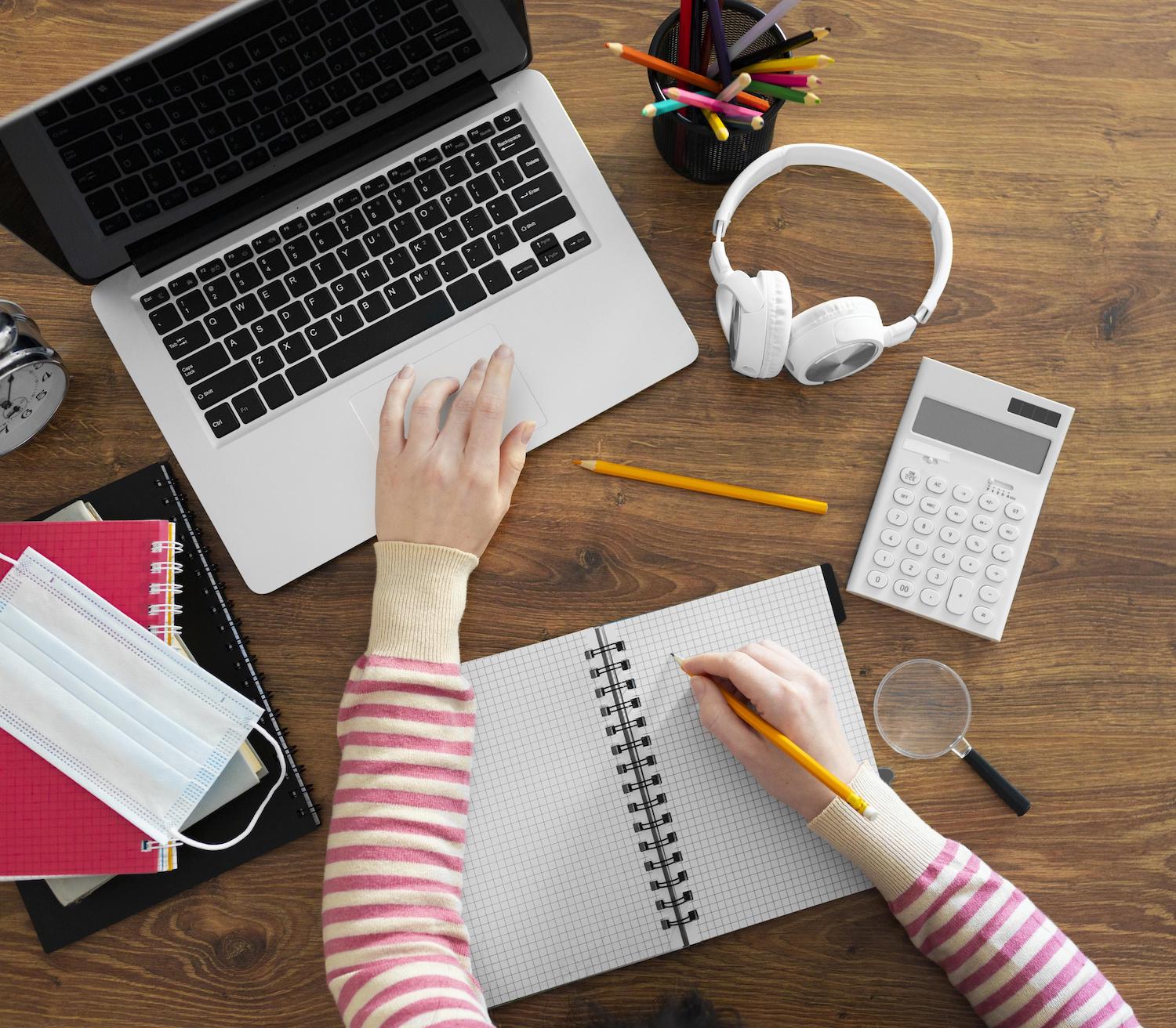 business owner writing in a notebook